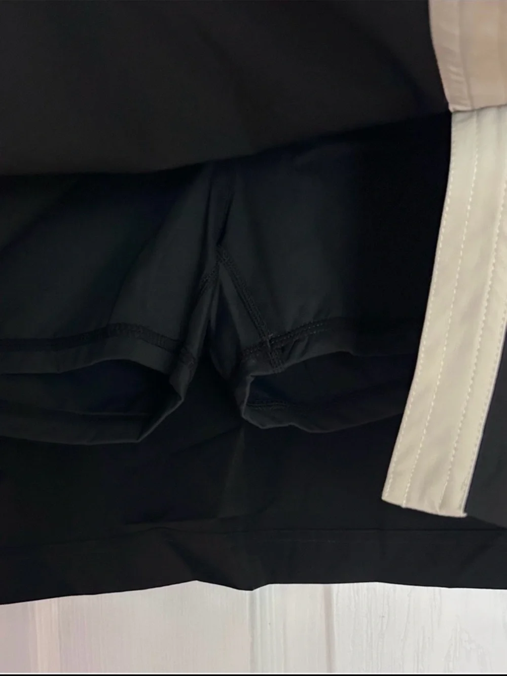 Halara SoftlyZero Quick Dry High Rise Tummy Control Mini Skirt Small Black NEW